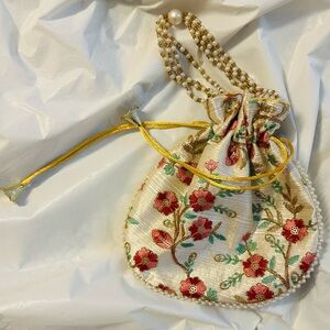 Multicolor Emboidered Floral Cream Pouch